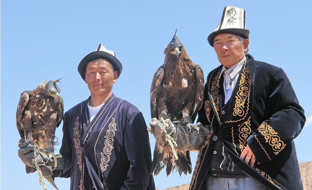 first and second prize winners collect prizes for eagle hunting